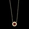 Tiffany & Co. 18K Yellow Gold Estate Carnelian And Diamond T Circle Pendant Necklace