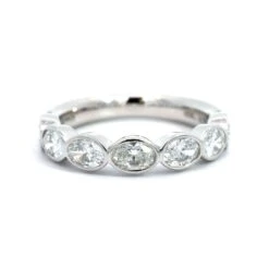 Platinum Bezel Set Oval Diamond Band